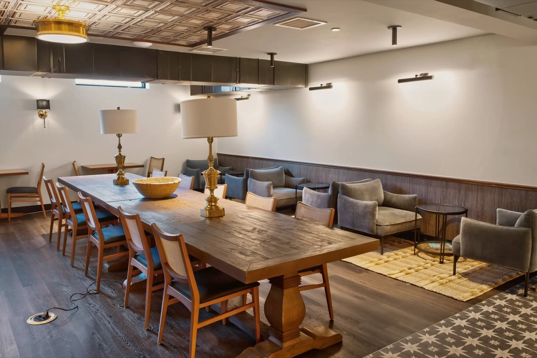 The Grove's communal table and lounge seating on the lower level of 315 E. Hyman Ave